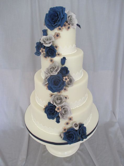 Navy And Gray Wedding Cake fondant covered with gum paste flowers Blue And Grey Wedding Cake, Navy Blue And Grey Wedding, Blue And Grey Wedding, Grey Wedding Cake, Gray Wedding Cake, Wedding Cake Navy, Wedding Cake Prices, Purple Wedding Cakes, Fondant Wedding Cakes