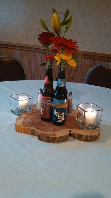 Beer bottle centerpiece I made for my brother's rehearsal dinner.... Beer Bottle Centerpieces, Beer Decorations, Beer Dinner, Bottle Centerpieces, Texas Decor, Beer Theme, Anniversary Dinner, Beer Bottles, Dinner Decoration