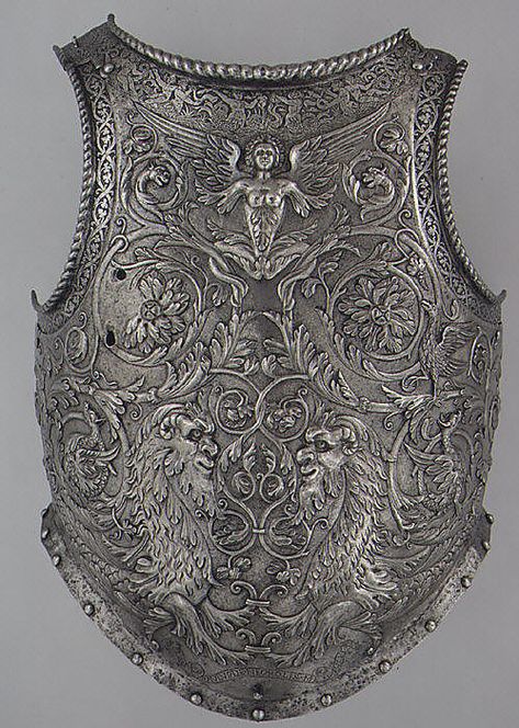 Italian (Milan) steel breastplate, c1545. Formerly part of a parade armor, this is the only signed work of Giovanni Paolo Negroli, a cousin of the more famous Filippo Negroli. Now bright, the breast plate's surface probably was originally russet-colored and the raised and etched areas were gilded. (Metropolitan Museum of Art) Hawke Dragon Age, Ancient Armor, Historical Armor, Armadura Medieval, Knight In Shining Armor, Knight Armor, Arm Armor, Medieval Armor, Art Japonais