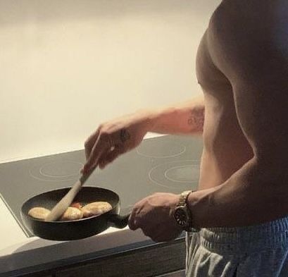 Man Cooking, A Man