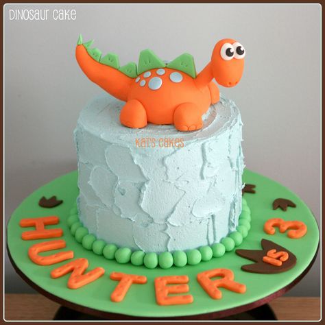 Dinosaur Cake   Theme: dinosaur  Cake: White chocolate mud  Filling: White chocolate ganache  Finish: Vanilla buttercream  Decorations: Hand made from fondant Dinosaur Baby Shower Theme, Dino Cake, Dinosaur Birthday Cakes, 3rd Birthday Cakes, Dinosaur Cake, Dinosaur Baby Shower, Boy Birthday Cake, A Dinosaur, Cakes For Boys