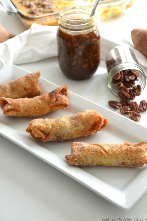 Sweet Potato Casserole Stuffed Eggrolls with Caramel Bourbon Pecan Praline Sauce Pecan Praline Sauce, Caramel Bourbon, Praline Sauce, Fall Recipes Pumpkin, Pecan Praline, Classic Thanksgiving, Egg Roll Recipes, Pecan Pralines, Sweet Potato Pie