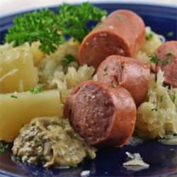 Alsatian Pork and Sauerkraut - Allrecipes.com Use golden or red potatoes instead of russet Pork And Sauerkraut Recipe, Pork And Sauerkraut, Sauerkraut Recipe, French Potatoes, Traditional French Recipes, Cubed Sweet Potatoes, Fancy Dishes, Kielbasa Sausage, Grilled Ham