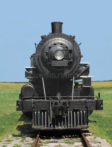 Photo about Front view of a vintage black railroad train steam locomotive, on tracks in a field with a clear blue sky in the background. Image of engine, retro, locomotive - 27206938 Train Front View, Train Tattoo, Clear Blue Sky, Steam Trains, Steam Locomotive, Front View, Train Station, Modern Vintage, Vintage Black