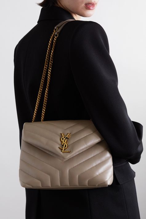 Originally created by graphic designer Adolphe Jean-Marie Mouron in 1962, SAINT LAURENT's iconic 'YSL' monogram continues to be recognized as an assurance of quality and luxury. This quilted 'Loulou' bag has been made in Italy from smooth leather detailed with signature chevron stitching. Though compact, it has a well-organized interior with two compartments, a zipped pocket and three card slots. Ysl Loulou Bag Small, Ysl Bag Outfit, Ysl Loulou Bag, Dream Bag, Ysl Logo, Bag Dark, Purse Brands, Lv Handbags, Dior Handbags