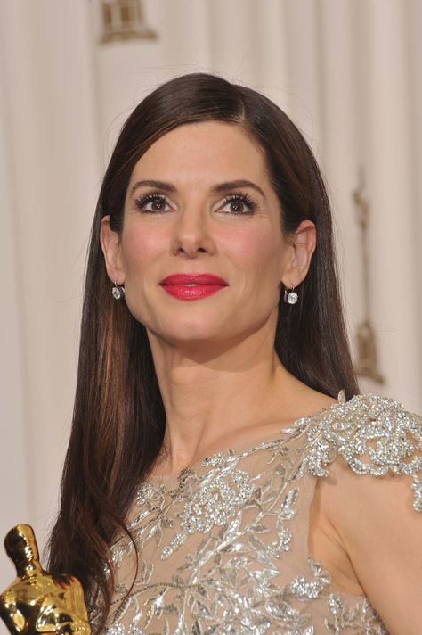 Sandra Bullock is an American actress who has had many iconic roles starting in the '90s. She established herself first as a leading lady in action and romantic comedies and, throughout the years, has taken various roles. Birthday July 26, 1964 Birth Place Arlington, Virginia, the United States of America Zodiac Sign Leo Personal Life Sandra Bullock married Jesse James in 2005. The couple divorced in 2010. #actresses #actressgallery #actressheadshot #actresshoutout #actresslife Sandra Bullock Hair 90s, Sandra Bullock Hair, Ciara Wilson, Lisa Kelly, Zodiac Sign Leo, Romantic Comedies, Arlington Virginia, Gemma Chan, Candace Cameron