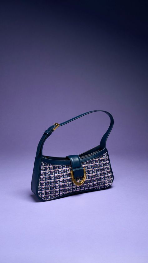 In navy tweed, the Gabine curved shoulder is both elegant and trendy — a fabulous statement piece for the new season. #CharlesKeithGabine #CharlesKeithFW22 #CharlesKeithOfficial Products featured: Gabine Curved Shoulder Bag Gabine Saddle Bag, Chunky Mules, Charles And Keith, African Print Maxi Skirt, Asymmetric Dress, Oversized Bag, Size Chart For Kids, Charles Keith, Best Bags