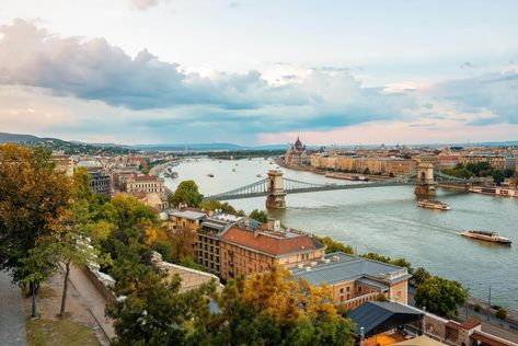 What to wear in Budapest in Fall - Wear When What Why Plain White Sneakers, Packing Wardrobe, Stone Street, Tourist Sites, Waterproof Rain Jacket, Camping Glamping, Fall Wear, Summer Linen, Raincoats For Women