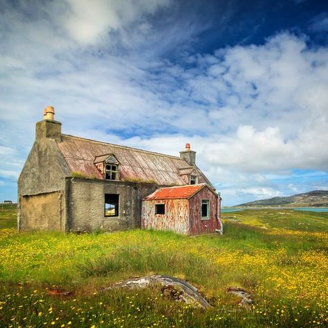 Abandoned croft house, Eriskay, Hebrides, Scotland. . Peter May fans may know this as Johnny’s house. . Look carefully through the windows… Scottish Croft House, Rural Gothic, Collage Examples, Scottish Croft, Haunted Buildings, Irish Cottages, Building Reference, Croft House, Hebrides Scotland