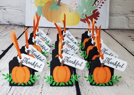 "Thanksgiving Hershey Nugget Holders, Thanksgiving Party Favors, Give Thanks Favor or Turkey Day Treat, Thanksgiving Treats, Table Decor. These unique 3D autumn Hershey nugget holders are perfect for you to give as a sweet treat to family and friends It would make a great addition to your Thanksgiving table or as a memorable favor to give your guests! These Hershey nugget holders are handmade from precision 65lb black cardstock. They have the sentiment saying \"Thankful\" and die-cut pumpkin and Thanksgiving Table Favors, Thanksgiving Turkey Treats, Treats Table, Fall Favor, Thanksgiving Candy, Thanksgiving Party Favors, Homemade Tags, Hershey Nugget, Thanksgiving Favors