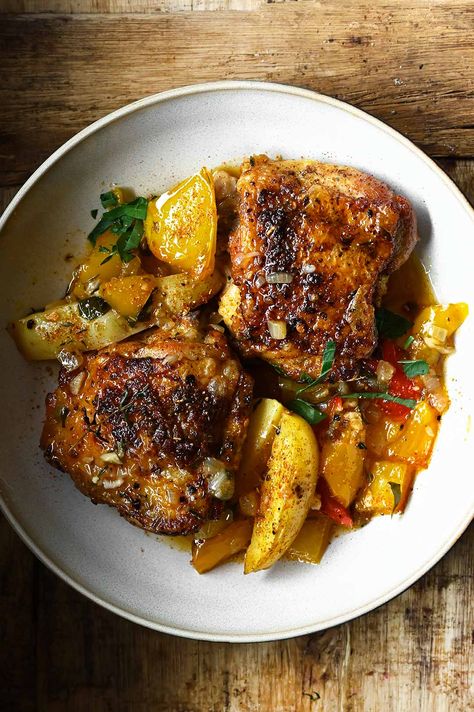 Braised Cajun Chicken with Potatoes Slow Cooked Chicken Thighs, Serving Dumplings, Braised Chicken Recipes, Chicken With Potatoes, One Skillet, Braised Chicken, Cajun Chicken, Chicken Potatoes, Potato Wedges