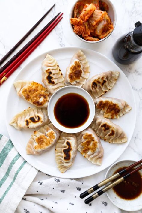 Kimchi mandu are the best! Crispy on the outside and moist on the inside, these spicy and smoky Korean dumplings pair beautifully with a cold glass of beer or hot sake.  Last week I made Chinese mushrooms and cabbage dumplings and this week I’m introducing you to its Korean cousin, the kimchi and tofu mandu! […] The post Kimchi Tofu Mandu (Korean Dumplings. – 만두) appeared first on Pickled Plum Food And Drinks. Mandu Recipe, Mandu Korean, Glass Noodles Recipe, Korean Dumplings, Dumpling Recipes, Chinese Mushrooms, Cravings Recipes, Easy Korean Recipes, Frozen Dumplings