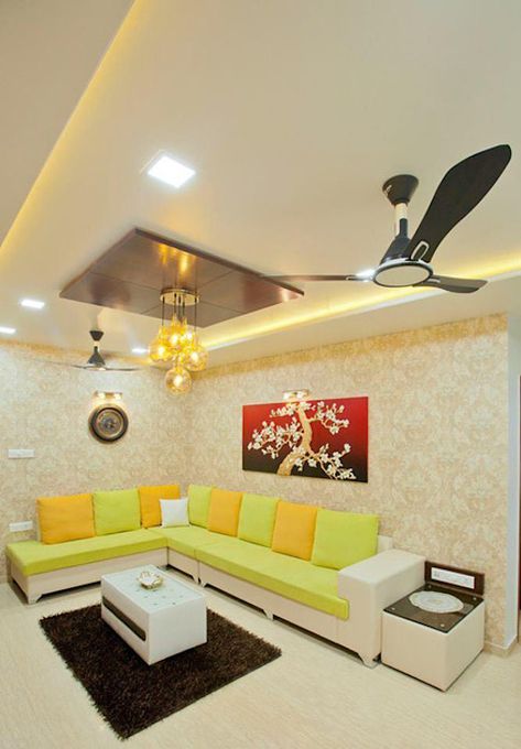 Beautiful and functional design for a 1200 sq ft home in Pune | homify Ceiling Design Living Room With 2 Fans, Hall Celling Design Modern With 2 Fans, False Ceiling Living Room With 2 Fans, Pop Design For Hall With 2 Fans, Living Room Designs Indian, Plafon Gypsum, House Ceiling, Indian Living Room, Indian Living Rooms