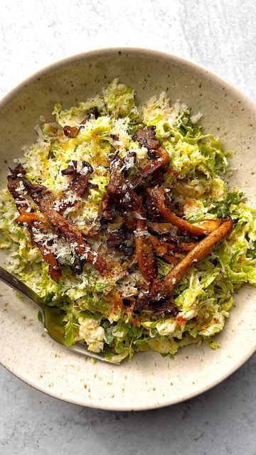 Carina Wolff on Instagram: "Shaved Brussels Caesar Salad with Spiced Oyster Mushrooms! I find brussels sprouts to be so much tastier raw than cooked, and they are the perfect vessel for a Caesar salad! I added some crispy oyster mushrooms on top for some texture, and of course lots of Parmesan cheese. I make my Caesar with mayo instead of raw yolk, which I know isn’t the classic prep but it works just as well and gives me a little peace of mind! RECIPE (serves 2) Salad 4 cups shaved brusse Fall Produce, Oyster Mushrooms, Hearty Salads, Caesar Salad, Pasta Bowls, Brussels Sprouts, Parmesan Cheese, Bowls Recipe, Salad Bowls