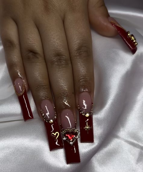 Red Nail Designs Y2k, Red Heart Charm Nails, Red Nails Acrylic Ideas, Dark Red Tapered Square Nails, Dark Cherry Red Nails Acrylic Design, Gold And Red Acrylic Nails, Red Nails With Gold Charms, Black Nails With Gold Charms, Dark Red Nails With Charms