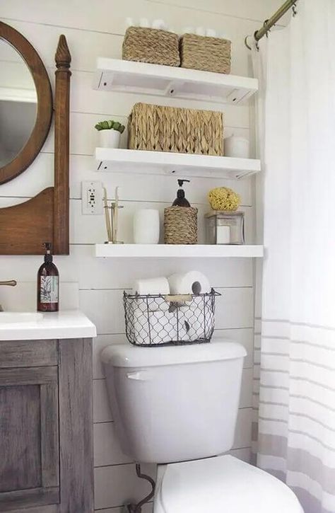 7+ Gorgeous Above Toilet Decor Ideas to Elevate Your Bathroom Three Shelves Above Toilet, White Shelves Above Toilet, Shelving Behind Toilet, Bathroom Floating Shelves Above Toilet, Above The Toilet Ideas, Above Toilet Shelves, Above Toilet Decor, Toilet Decor Ideas, Small Toilet Decor