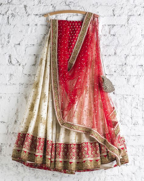 Another cream lehenga with a red dupatta Lehenga Hanging, Cream Lehenga, Sari India, Indian Things, Orange Lehenga, Asian Dresses, Asian Clothes, White Lehenga, Indian Outfits Lehenga