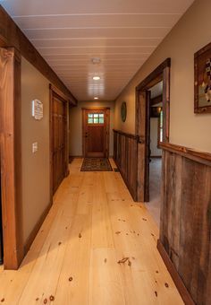 Wood Waynes Coating Rustic, Wood And Sheetrock Walls, Rustic Wall Trim, Half Sheet Rock Half Wood Walls, Wood Paneling For Walls, Paint Colors With Dark Walnut Trim, Inside Trim Ideas, Barnwood Trim Interior, Cabin Interior Wall Colors