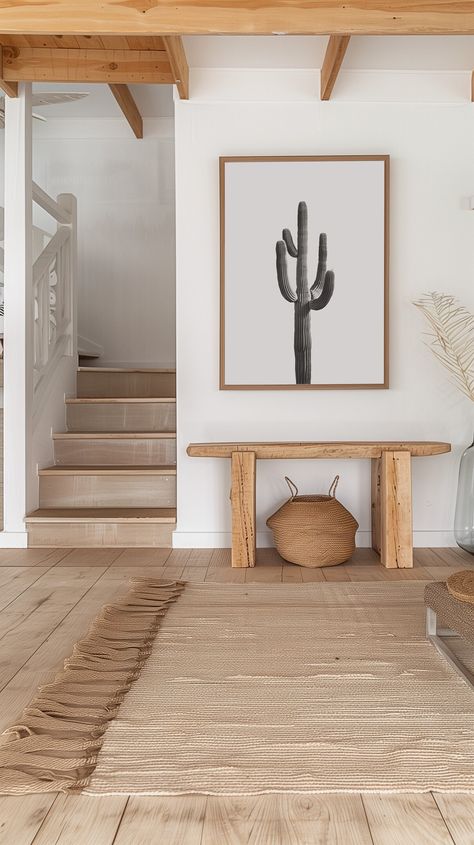 Bring the serene beauty of the desert into your home with this minimalist black and white cactus print. This striking photograph captures the elegant form of a tall cactus set against a clean white background, making it a perfect addition to any modern or minimalist decor. Ideal for living rooms, bedrooms, or office spaces, this art piece adds a touch of nature and tranquility to your space. Available in various sizes, this print is ready to frame and display. Elevate your home decor with this t Desert Prints Wall Art, Desert Chic Home, Desert Theme Interior Design, Desert Coastal Decor, Modern Southwest Entryway, Modern Western Entryway, Desert House Interior Design, Desert House Decor, Scandinavian Western Interior