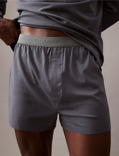 Crafted from a cotton modal stretch blend, this knit boxer is designed with exceptional comfort in mind. Styled with a flexible Calvin Klein logo waistband for a fit that adjusts to your form. Cut in a full rise silhouette with a low leg line.  Material: 55% Cotton, 37% Micro Modal, 8% Elastane. Calvin Klein Boxers, Men's Boxers, Black Lounge, Mens Boxers, Calvin Klein, Lounge, Knitting, Gifts, Quick Saves