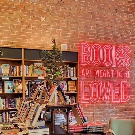 Britnae Purdy on Instagram: "Posted @withregram • @americanbooksellers Books are meant to be loved. ❤️🐶 Happy Valentine's Day! Today we're spotlighting @dogearedbooksames, an indie bookstore in Ames, Iowa—complete with shop pup, Lovie! Here's to a day sharing the love of books. 📍 @dogearedbooksames 📸 @dogearedbooksames #valentinesday #love #booklover #booklove #bookworm #worldbookshops #bookstore #bookshop #bookstagram #igreads #indiebookstore #indiebookshop #shelfie #neon #shopsmall #shoploc Cozy Bookshop Cafe, Own A Bookstore, Book Store Displays Visual Merchandising, Book Store Ideas Design, Bright Bookstore, Book Business Ideas, Romance Book Store, Indie Bookstore Aesthetic, Book Store Ideas Business