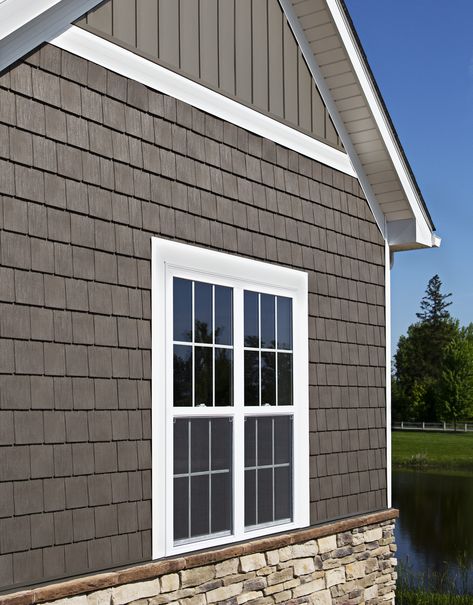 House exterior finished in ProVia Timberbay Cedar Shakes, Board n' Batten vinyl siding and stone veneer Painted Brick And Vinyl Siding House Exterior, Bottom Brick Top Siding, Board And Batten Cedar Shake, Cedar Shakes And Board And Batten, Hardie Board Siding Ranch House, House With Shingles And Siding, Shakes On House Exterior, Shaker Siding Accent, Shake Shingle Siding Color Schemes