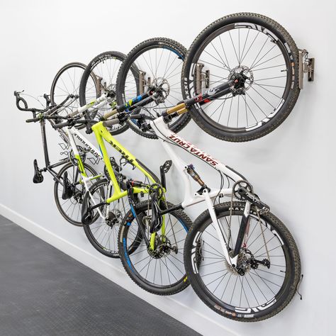 PRICES MAY VARY. BICYCLE STORAGE: Reclaim garage space with this 4-pack of swiveling wall mount bike racks for organization that stores your bikes flat against the wall. Ideal for home and garage bike storage, as well as small spaces like an apartment or shed. Store all kinds of bicycles, including road bikes, mountain bikes, e-bikes, kids’ bikes, and more. Fits bike tires up to 2.6" wide and up to 29" in diameter. With this 4 bike rack, keep your wheels ready for adventure without taking over y Bike Storage Wall, Garage Bike Storage, Bicycle Storage Rack, Snowboard Storage, Indoor Bike Storage, Bike Rack Garage, Wall Mount Bike Rack, Bike Storage Garage, Bike Hanger