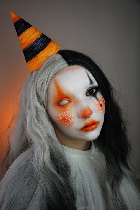 By @uncreative.af #halloween #halloweenmakeup #bodypaint #clownmakeup #halloweenclown #clown Halloween Makeup Clown Cute, Orange And Black Clown Makeup, Cool Makeup Halloween, Clown Makeup Photoshoot, Cool Sfx Makeup Ideas, Pumpkin Clown Makeup, Uv Clown Makeup, Clown Makeup Horror, Zombie Clown Makeup