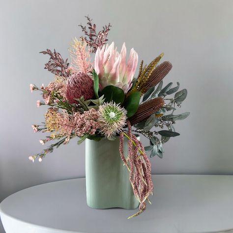 Have you seen Maree?! This stylish front facing arrangement comes featured in our sage cypress vase to complete the package. A unique and stunning design that will be sure to enhance any space! King Protea, Hand Tied Bouquet, Real Touch Flowers, Flower Studio, Silk Flower Arrangements, Plant Vase, Vase Arrangements, Wedding Arrangements, Artificial Flower Arrangements