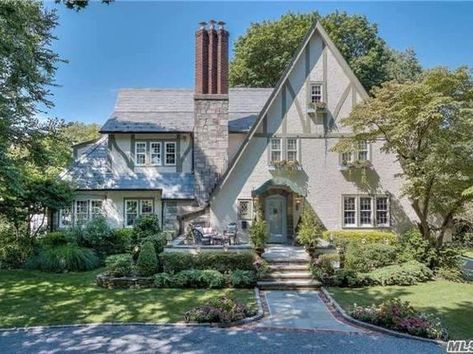 58 Washington Ave, Garden City, NY 11530 | Zillow Tudor Landscaping, Tudor Addition, Storybook Tudor, Tudor Homes, Tudor Cottage, Real Estate Guide, River Forest, Tudor Style Homes, Storybook Cottage