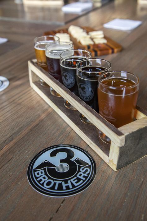 Three Brothers Brewery serves up local craft beer with a focus on supporting local farmers and businesses in Harrisonburg, VA. Photo courtesy of Sarah Hauser and the Virginia Tourism Corporation #localbeer #vabeer #drinklocal #craftbeer #beerflight Beer Flight Holder, Beer Taster, Beer Goggles, 50th Birthday Gag Gifts, Beer Flight, Wood Block Crafts, Virginia Is For Lovers, Garage Work Bench, Beer Tasting