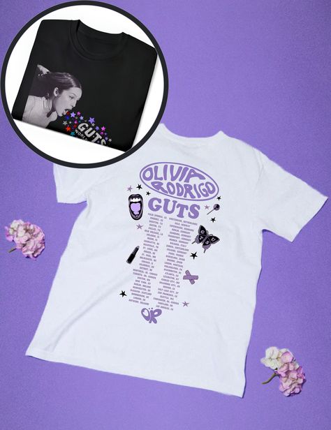 GUTS Tour Shirt, Olivia Rodrigo Merch, Album Tracklist Tee, Vintage Olivia Tour T-Shirt GUTS Merch, Teenager Girl Gifts Guts aesthetic Shirt Exciting news for all Olivia Rodrigo fans! Olivia has just announced her highly anticipated "Guts World Tour," and you won't want to miss out on this incredible musical journey. And guess what? Our "Guts Tracklist" shirt is the perfect way to gear up for this epic event! As Olivia takes the stage to perform all the heart-wrenching and empowering songs from her latest album, you can be right there in style, proudly wearing this unique merch item. It's not just a shirt; it's a statement of your devotion to Olivia's music and her sensational live performances. Imagine being in the crowd, singing along to every lyric, with this shirt as a badge of honor. Guts Aesthetic, Olivia Rodrigo Merch, Empowering Songs, Album Tracklist, Kawaii Clothes Goth, African Savannah, Olivia + Core + Aesthetic, Guts Tour