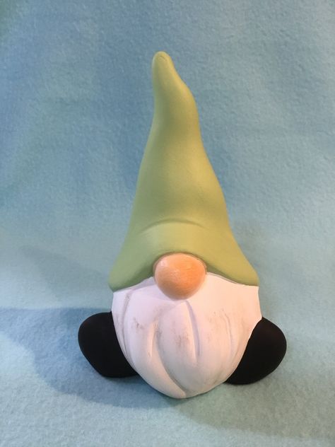 "Handcrafted, green, ceramic, Gnome statue, which is app. 6\" tall. Safe for outside! Great for a gnome collector or for gifting or as a Home decor. I have made these completely from mixing the clay to all the delicate hand painting. As an artist if 43 years, I only offer Perfection!" Gnome Ceramic, Tinkerbell Cake, Statue Garden, Glass Hummingbird, Paracord Diy, Gnome Statues, Gnomes Diy, Clay Crafts Air Dry, Snowman Painting