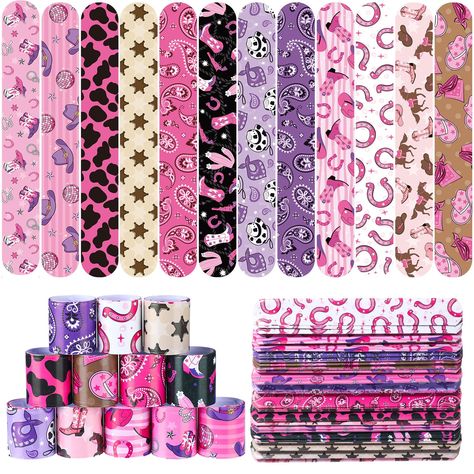 PRICES MAY VARY. Package Includes: you will get 48 pieces of western party slap bracelets in 12 different designs, enough to meet your daily and party needs, ideal for Western theme party, pink cowgirl disco birthday party, last rodeo bachelorette party, etc.; Can be applies as disco pink cowgirl bachelorette party favors Novel Western Themed Party Design: our horse wristbands feature pink, purple, black and brown color with classic Western cowgirl theme elements, like pink horseshoes, pink boot Kids Western Party, Cowgirl Candy, Western Theme Birthday Party, Cowgirl Bachelorette Party Favors, Western Party Favors, Cowgirl Party Favors, Cowboy Party Favors, Horse Party Favors, Last Rodeo Bachelorette