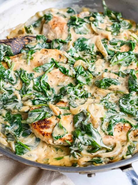 his is a comforting chicken dinner your whole family will love. Juicy seasoned chicken is sautéed in one skillet with a creamy cashew sauce and spinach.  It's done in under 30 minutes, perfect for a weeknight. It's  paleo, gluten free, dairy free and keto. Chicken Spinach Coconut Milk Recipes, Chicken And Spinach Recipes Dairy Free, Chicken And Kale Recipes Dinners, Chicken And Kale Recipes, Chicken Recipes Dairy Free, Chicken And Spinach Casserole, Chicken Spinach Recipes, Creamy Spinach Chicken, Coconut Milk Chicken