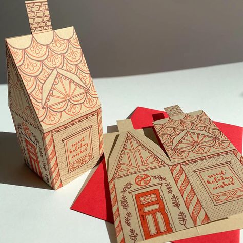 Just fold and glue to create this sweet 3D letterpress Gingerbread House. • blank inside and measures 4.25”x5.5” folded • folded card is letterpress printed in warm red and dark red on 100# kraft paper • die cut and scored • accompanied by an A2 red envelope • card comes flat with envelope, you fold & glue to make a 3D house! Beautifully llustrated by Élise Lassonde and made in the United States. Bespoke Christmas Cards, Chipboard Gingerbread House, Gingerbread Packaging, Kraft Paper Christmas Cards, Gingerbread House Card, 3d Gingerbread House, 3d Gingerbread, Gingerbread Cards, Art Content