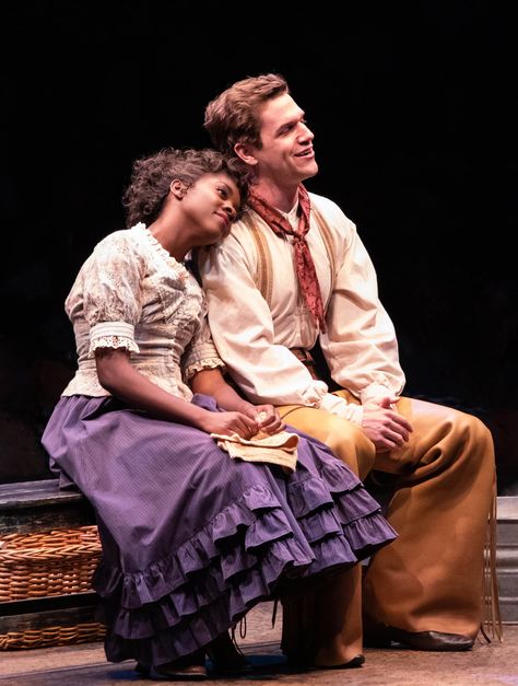 Emilie Kouatchou as Laurey Williams and Ryan Vasquez as Curly McLain in OKLAHOMA! produced by Broadway At Music Circus at the Wells Fargo Pavilion June 25-30. Photo by Charr Crail. Oklahoma Musical Costumes, Yellow Theatre Aesthetic, Oklahoma The Musical Costumes, One Woman Show Theatre, Oklahoma Set Design, Curtains Hair, Randy Castillo, Oklahoma The Musical, Oklahoma Musical