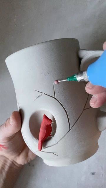 AP Curiosities on Instagram: "Adding winterberries to a cardinal mug. ❄️ Just have to add some more finishing touches and then am planning to get some work through the kiln this week (finally)! I always forget how long each step takes. Thank you all for your patience with this round of work - I’m so excited to get these pieces out into the world. I will be announcing a date for the first work release of the year to my email list soon! So close... stay tuned! . . . . . #mugshotmonday #xiemtools Clay Cardinal, Pinch Pot Mug, Ceramic Cardinal, Creative Pottery, Pottery Inspo, Pottery Handbuilding, Clay Hand, Bird Crafts, Ceramics Ideas