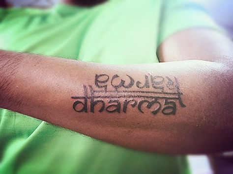 Karma Dharma Tattoo, Dharma Tattoo, Quote Tattoo Ideas, Karma Quote, Tattoo Artists Near Me, Karma Tattoo, Sanskrit Tattoo, Phrase Tattoos, Sigil Tattoo