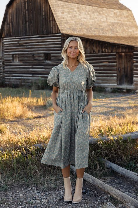 Featuring a v-neckline, waist tie, and pockets, the Our Song Puff Sleeve Dress has the cutest floral pattern that will have you standing out in a crowd. Pair with boots this Fall but keep this dress around come Springtime! back zipper closure with hook + eye unlined pockets // paired with the free people essential chelsea boots in antiquewhite + the something new pointelle cardigan Prairie Style Dress Outfit, Church Outfit Spring, Cute Fall Dresses, Cute Modest Dresses, Modest Summer Fashion, Our Song, Pointelle Cardigan, Cute Modest Outfits, Puff Sleeve Dress