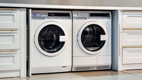 Ventless, stackable, and efficient, you can even tuck this space-saving duo beneath your kitchen counter. Laundry Room Stackable, Ventless Dryer, Compact Washer And Dryer, Laundry Room Storage Shelves, Compact Laundry, Small Laundry Room Organization, Stackable Washer And Dryer, Small Laundry Room, Small Laundry