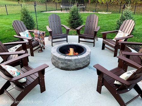 concrete patio with fire pit and chairs Fire Pit Ideas Backyard Concrete, Firepits Backyard Cement, Patio Chairs Around Fire Pit, Fire Pit Concrete Patio, Cement Fire Pit Area, Cement Patio With Fire Pit, Outdoor Fire Pit Chairs, Concrete Patio Fire Pit Ideas, Round Concrete Patio