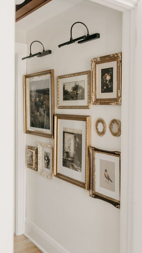 Gold Picture Frame Gallery Wall, Golden Picture Frames On The Wall, Lighted Gallery Wall, Gallery Wall Ideas Gold Frames, Wall Of Gold Frames, Classy Gallery Wall, Gold Frame Collage Wall, Photo Wall With Sconces, Gallery Wall Gold Frames