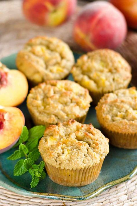 Fresh Peach Paleo Muffins with chunks of peaches baked in. The flavor of the peaches is wonderful with the almond, honey and lemon. {gluten-free, grain-free} | cookeatpaleo.com Lemon Muffins Recipes, Paleo Peach Muffins, Peaches Baked, Peach Muffin Recipes, Paleo Muffin Recipes, Gf Muffins, Paleo Breakfasts, Paleo Snack, Peach Muffins