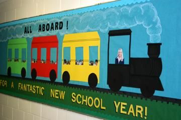 Photo Source: Classroom Displays & Bulletin Board  Wondering how to welcome your new students to the classroom this school year? Try this train idea from Classroom Displays and Bulletin Boards! Most students have their previous year's class picture in their file, so take advantage of this; not only to 'get to know' them before the year begins, but to personalize their new classroom! Welcome Train Bulletin Board   Background: Blue bulletin board paper for the sky and green bulletin board pap Train Bulletin Boards, Bear Decorations, Class Bulletin Boards, Teacher Bulletin Boards, Fall Bulletin Boards, Preschool Bulletin, Preschool Bulletin Boards, Train Theme, Back To School Bulletin Boards