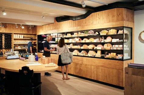 Enter in a new cheese shop, it uses a strong design typology where customers can feel and touch the products displayed in the fridges Display Fridge, Cheese Store, Cheese Display, Cheese Shop, Cold Storage, Swiss Cheese, Store Interior, Shop Display, Liquor Cabinet