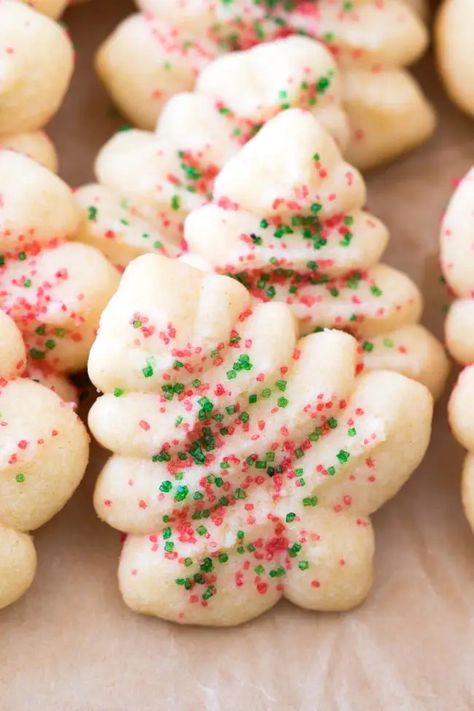 Holiday Spritz Cookies Recipe - These easy Christmas spritz cookies are a wonderfully tasty classic! #Holiday #Christmas #Cookies #Spritz Elf Snacks, Cream Cheese Spritz, Christmas Spritz, Cream Cheese Spritz Cookies, Spritz Cookie Press, Gooey Desserts, Christmas Spritz Cookies, Holiday Deserts, Spritz Cookie