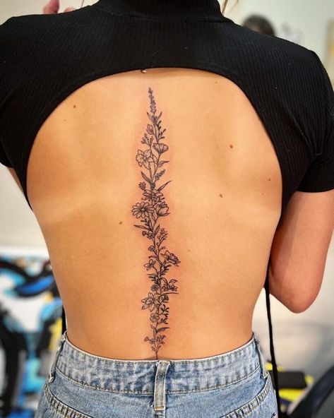 22 Intricate Ideas For Your Vine Back Tattoo Back Tattoo Women Spine Unique Sunflower, Narcissus Flower Spine Tattoo, Daisy Spine Tattoo, Unique Back Tattoos, Floral Back Tattoos, Flower Spine Tattoos, Western Tattoos, Spine Tattoos For Women, Pretty Tattoos For Women