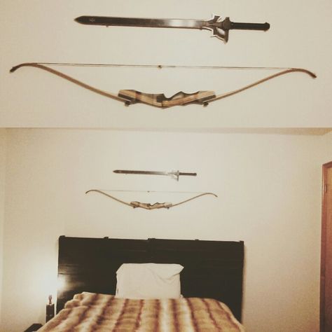 Pallet Bed » Recurve Bow » Kirito's Elucidator from SAO  Made the bed using pallets and black wood stain, and then mounted my bow and sword above it! Thinking next I'll mount some wooden arrows with feather fletching on either side.  #Pallet #Pallets #Bed #Room #Decirating #SAO #Kirito #Elucidator #SwordArtOnline #DIY #Medieval #Recurve #Bow #Archery #Wood Pallets Bed, Sao Kirito, Bow Archery, Black Wood Stain, Wooden Arrows, Pallet Bed, Over The Bed, Recurve Bow, Bow And Arrow