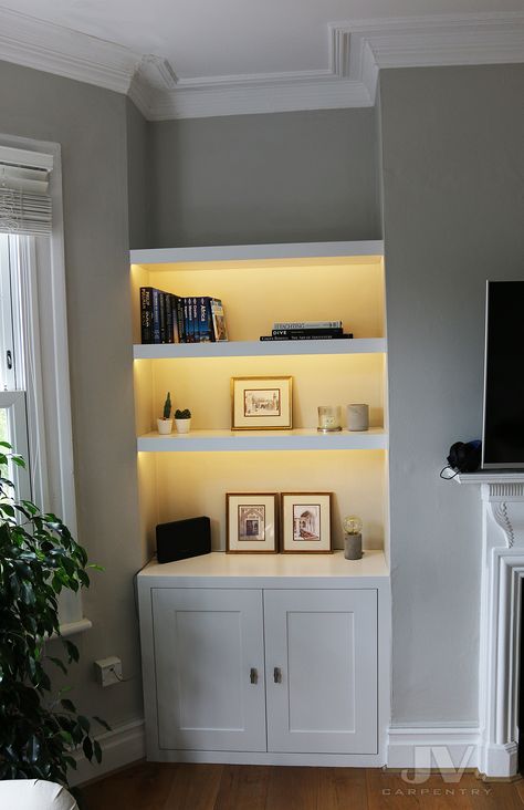 White Alcove Cupboards, Living Room Built In Storage Ideas, Cupboard And Shelves In Alcove, Living Room With Alcove Ideas, Shelving For Alcoves Living Rooms, Alcove Lighting Living Room, Alcove Shelving Lighting, Fireplace Alcove Storage, Chimney Alcove Shelves